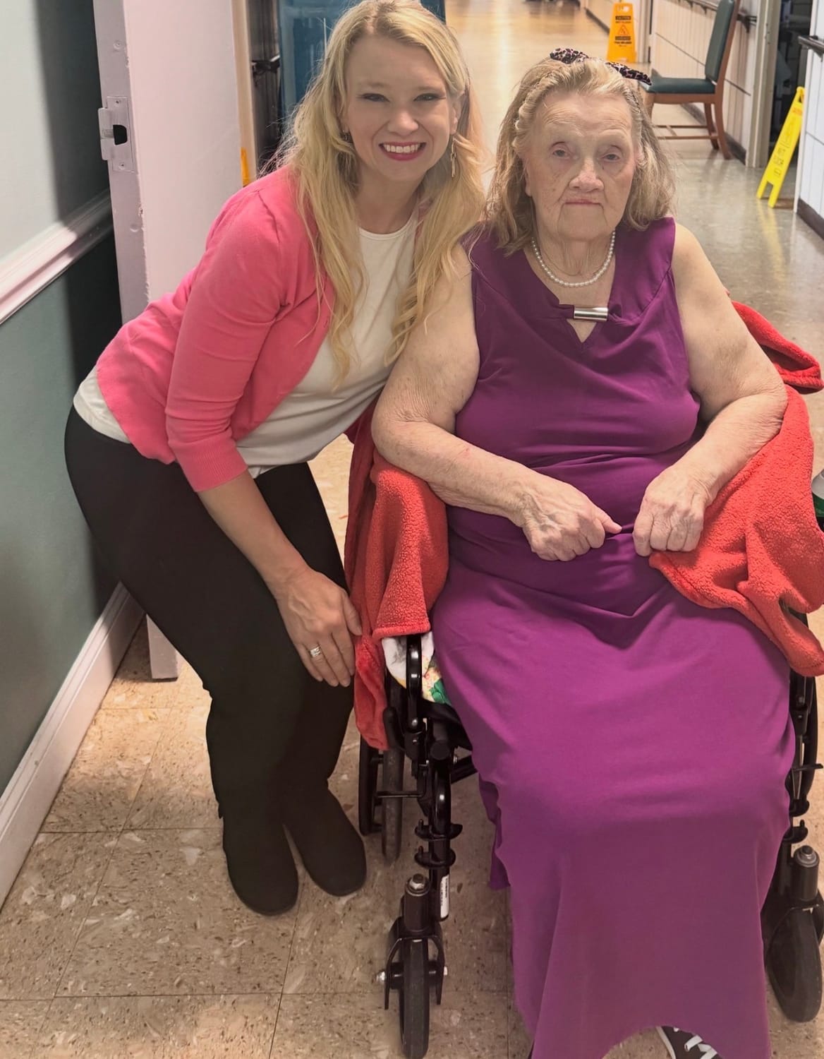 A Perkins Country Manor resident and team member at a community event